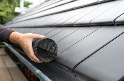 Home with Installed Gutter Covers